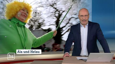 Moderator vor Bild mit Topthema