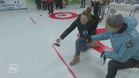 Sportlerin beim Eisbügeln