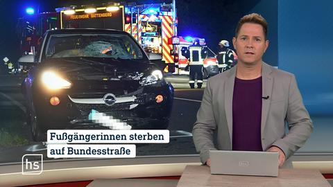 Moderator vor Bild von Topthema