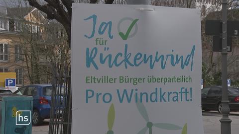 Schild zum Bürgerentscheid Thema Windkraftanlagen