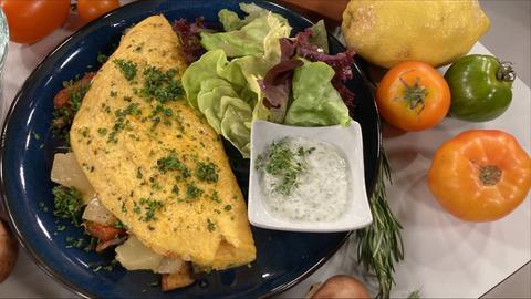 Omelette mit Handkäs, Pilzen und Tomaten