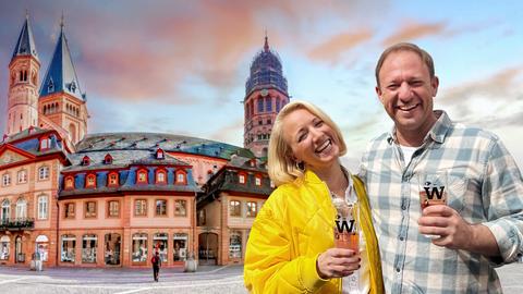 Tobi Kämmerer mit Anna Lena Dörr mit Weinschorle vor dem Mainzer Dom.