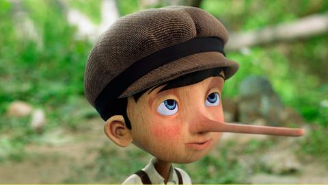 Holzfigur Pinocchio im Profil